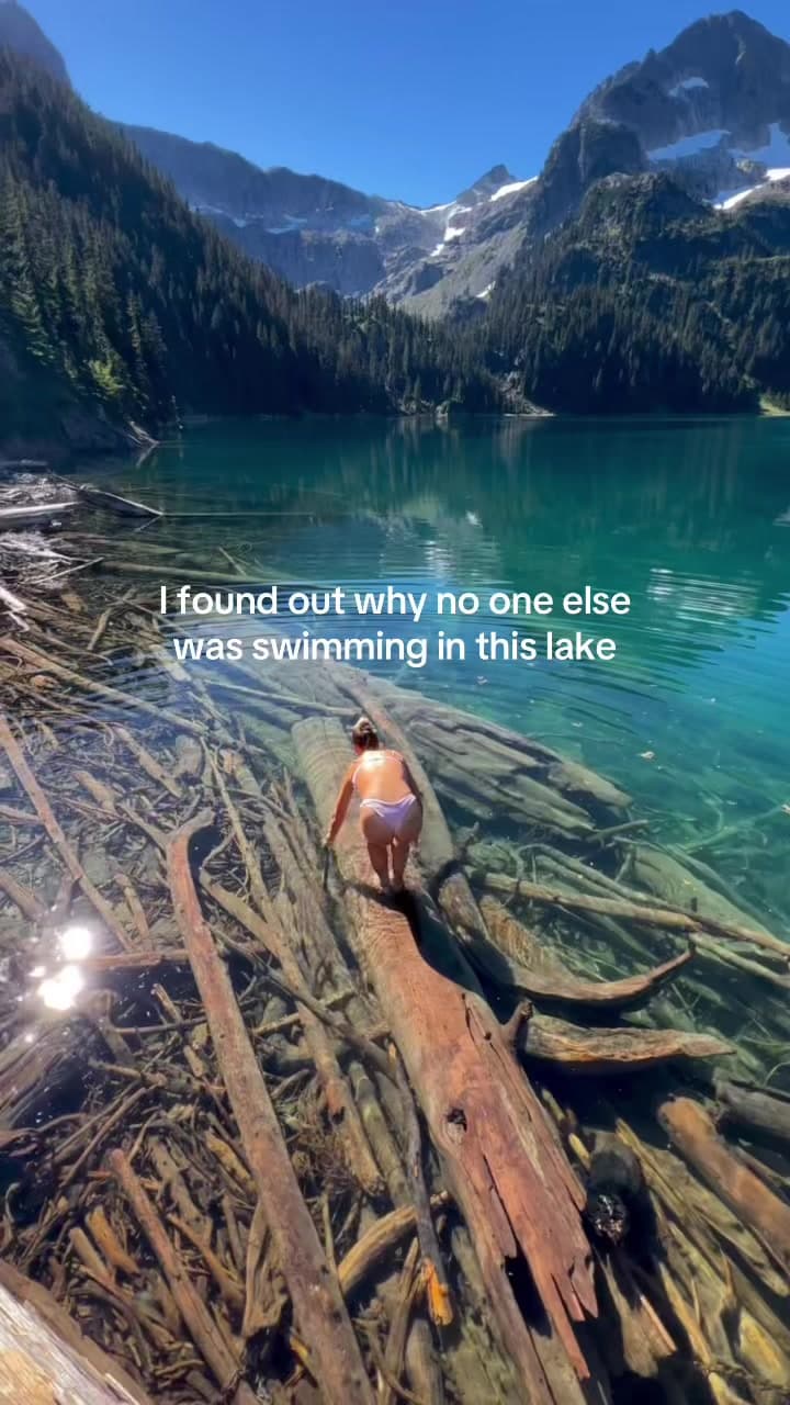 @parislike.france — The most beautiful spot in the world but swim at your own risk 😂 #alpinelake #adventure #travel #fyp #glacier 